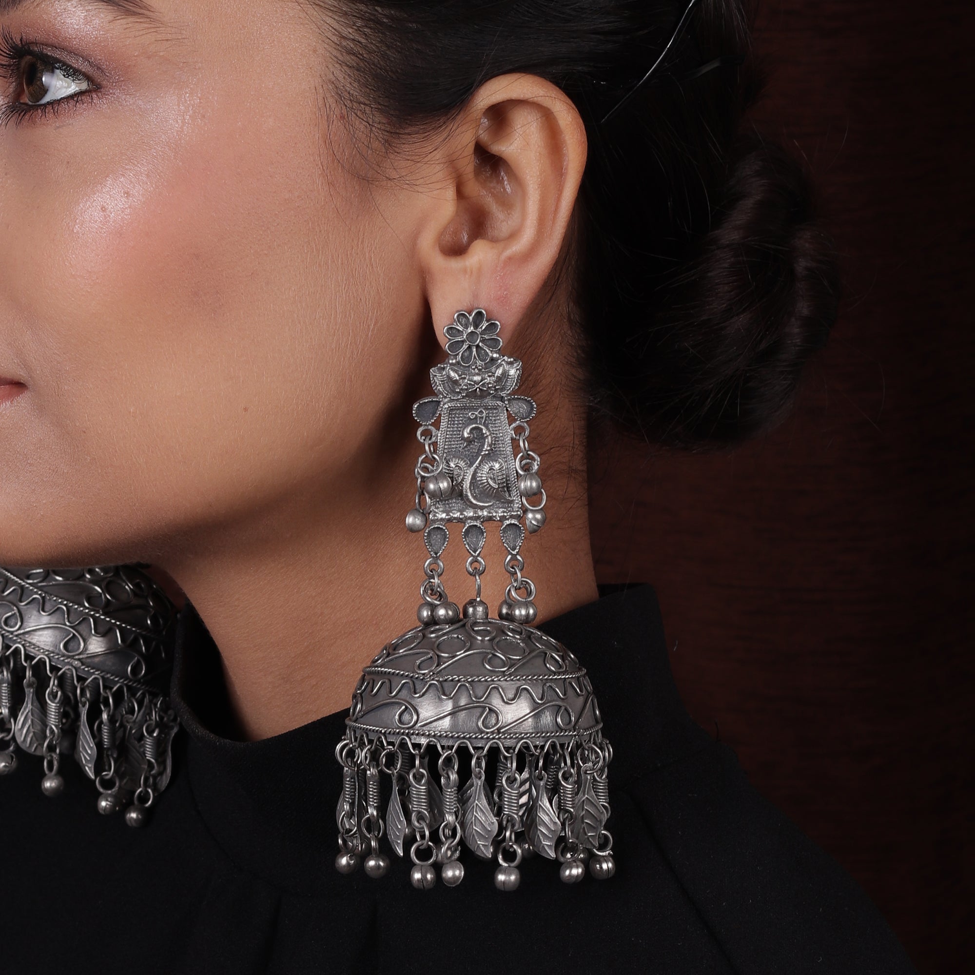 Peacock hot sale silver jhumkas